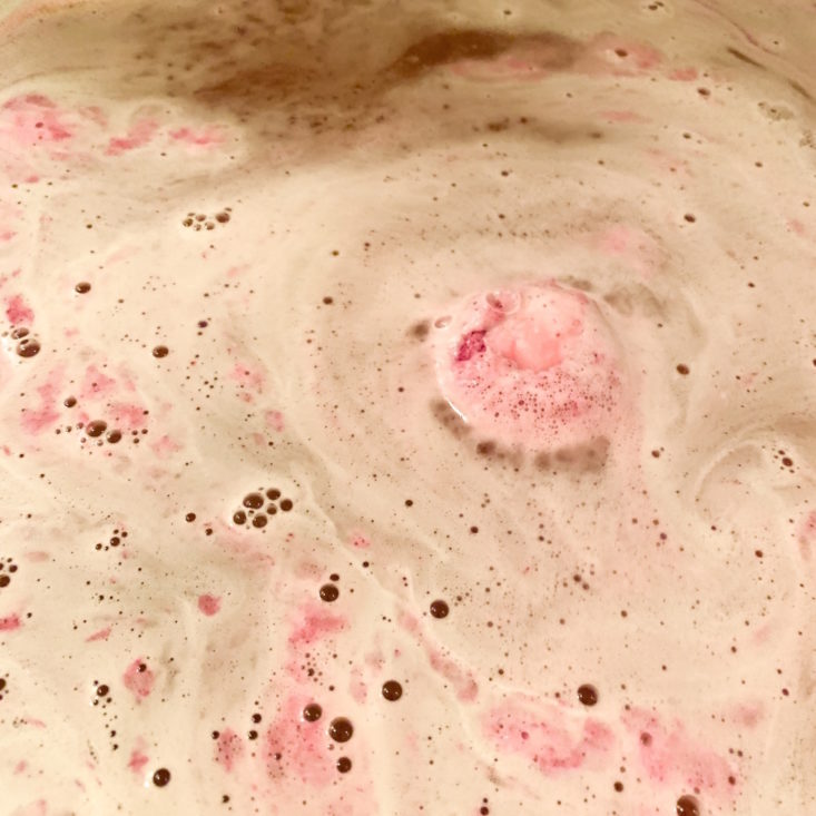 Bubbles & Books February 2019 - Raspberry Rosebud Bath Bomb Creamer by Simply Organico In Water 1