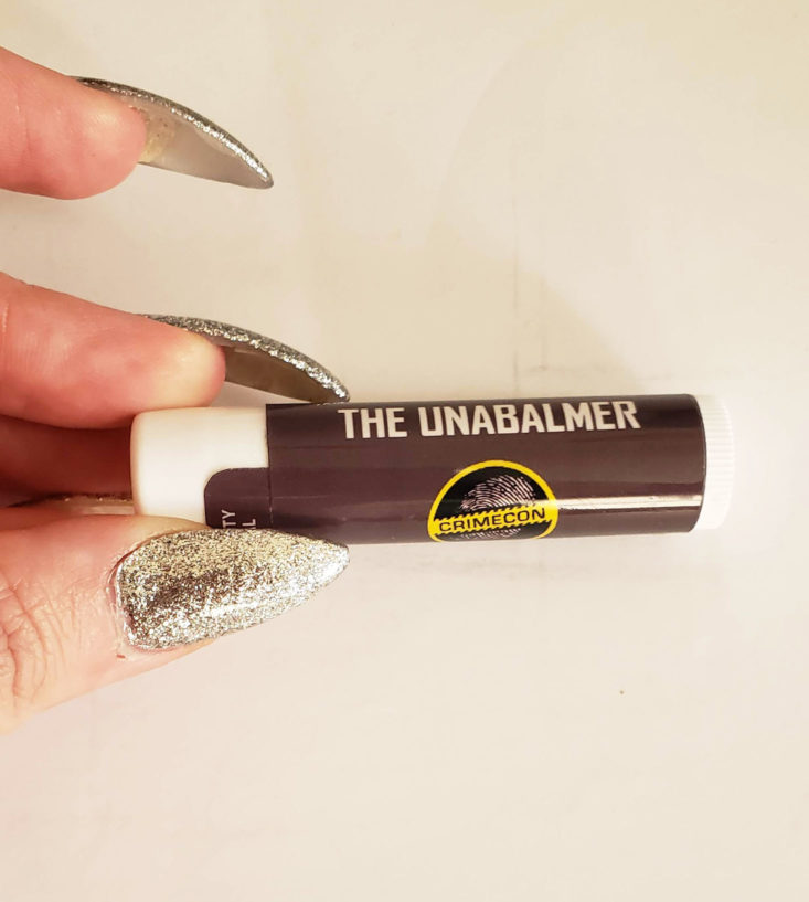 Creepy Crate Winter 2019 Review - Crime Con Advert with Unabalmer Lip Balm Top