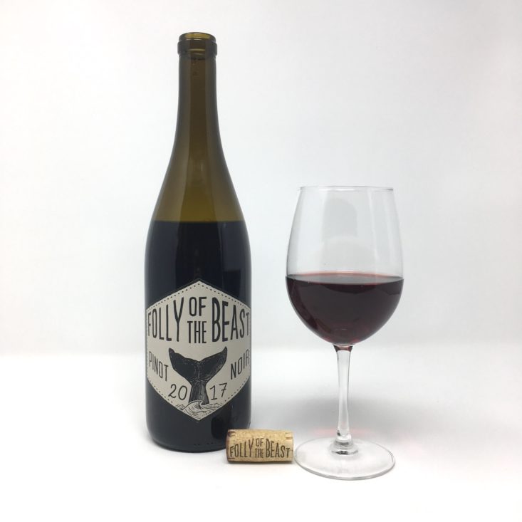 Folly of the Beast Pinot Noir Bottle and Glass