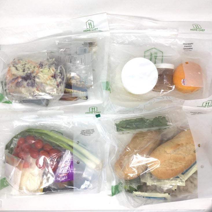 a laydown of all four bagged recipes included in the july 2019 home chef box