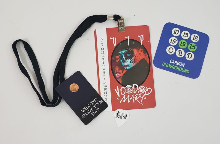 Deadbolt Mystery Society August 2019 - Backstage Pass, a Coaster, a Room Key and a Guitar Pick Top