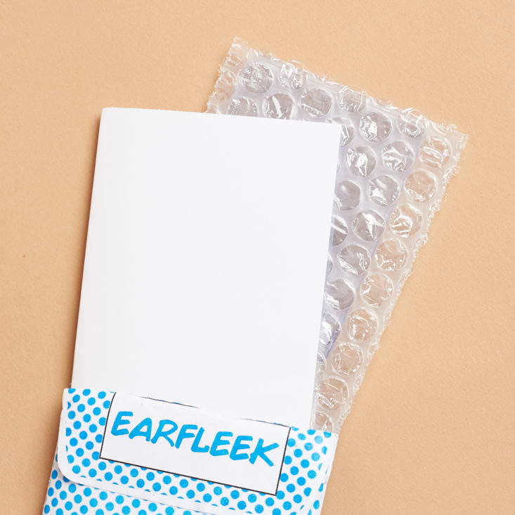 open envelope showing packaging inside