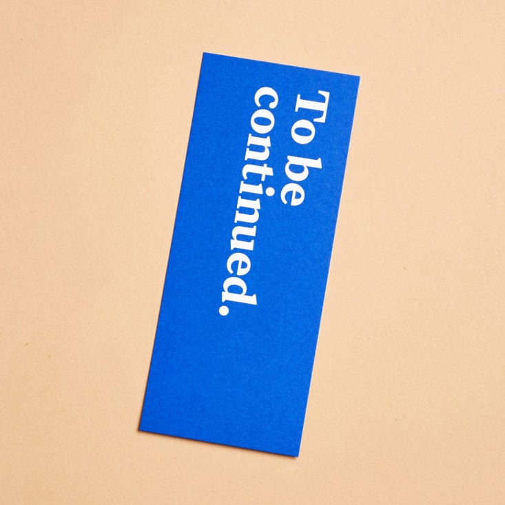 cobalt blue bookmark with "to be continued" on the front