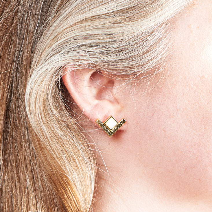 earrings on megans ears