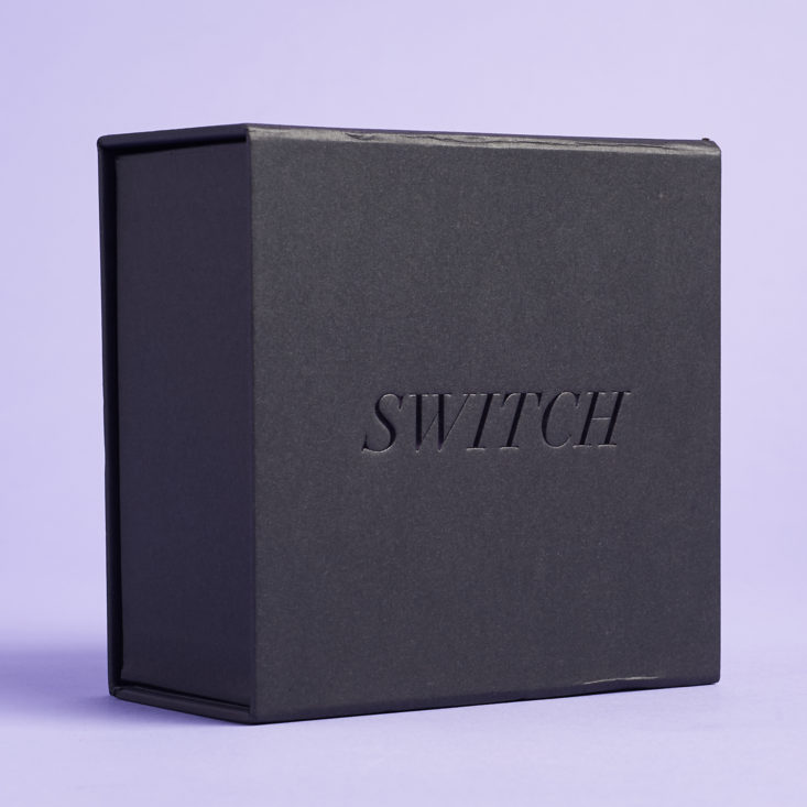 matte black box with glossy switch logo