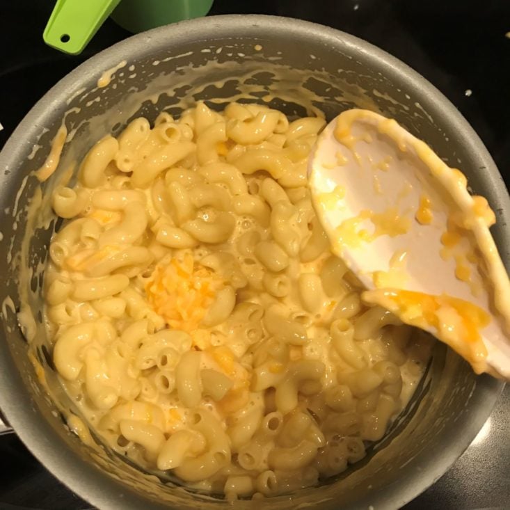 Young Chef's Club November 2019 mixing in cheese
