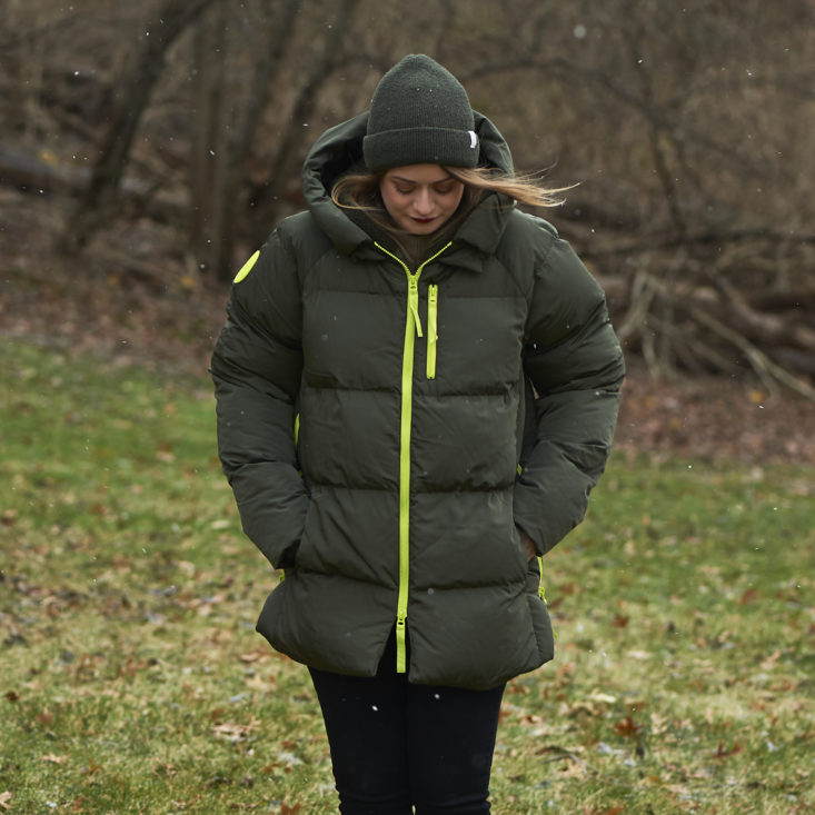 Marne wearing Fabletics Voyage Puffer Coat in Military Green/Citron outside